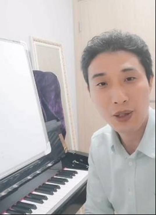 周怡（海南师范大学音乐学院讲师）